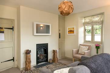 A pretty ornamental fireplace within the lounge.