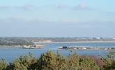 Taken from Hengistbury Head, this view shows the entrance to Christchurch harbour, Mudeford Quay to the left and Mudeford Sandbank to the right. - Thumbnail Image