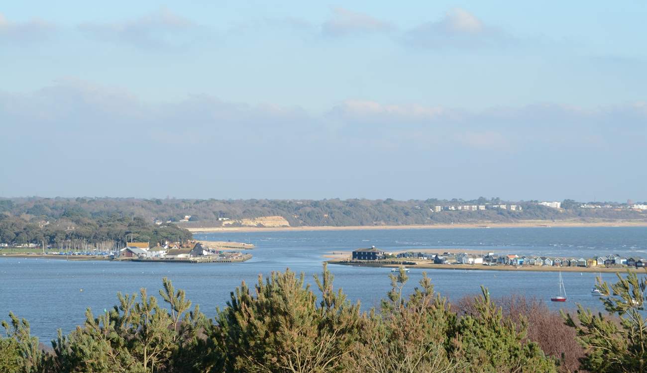 Taken from Hengistbury Head, this view shows the entrance to Christchurch harbour, Mudeford Quay to the left and Mudeford Sandbank to the right.
