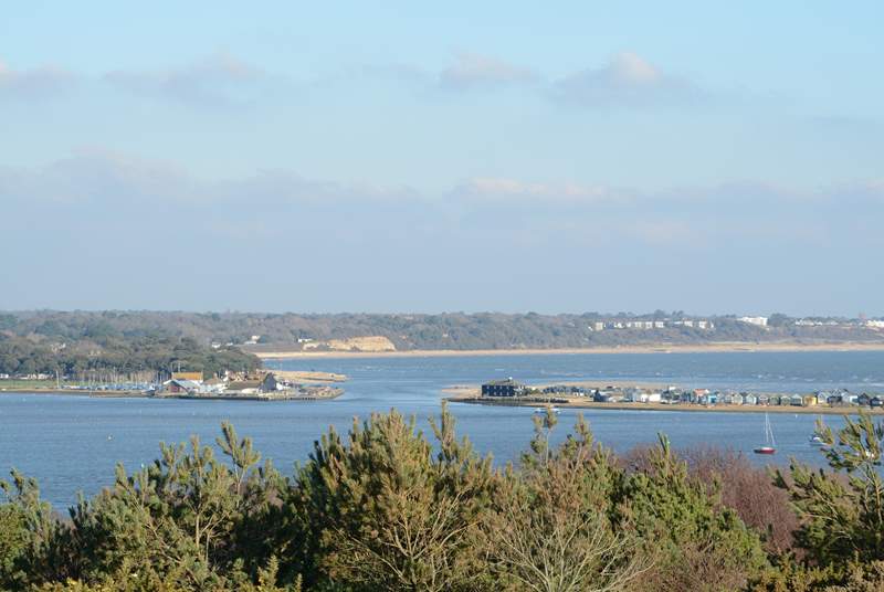 Taken from Hengistbury Head, this view shows the entrance to Christchurch harbour, Mudeford Quay to the left and Mudeford Sandbank to the right.