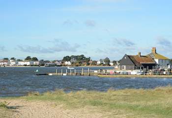 Looking across the mouth of Christchurch Harbour towards Mudeford Quay, ferry trips and adventure boat trips leave from the Quay.