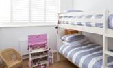 The cheerful children's room, bedroom 3, has 3ft bunk-beds and a beautiful doll's house to play with. - Thumbnail Image