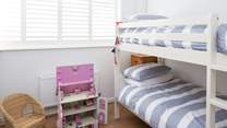 The cheerful children's room, bedroom 3, has 3ft bunk-beds and a beautiful doll's house to play with.