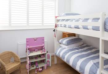 The cheerful children's room, bedroom 3, has 3ft bunk-beds and a beautiful doll's house to play with.