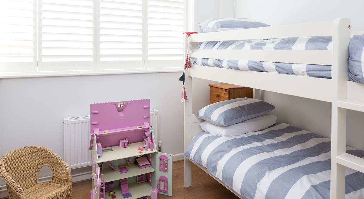 The cheerful children's room, bedroom 3, has 3ft bunk-beds and a beautiful doll's house to play with.