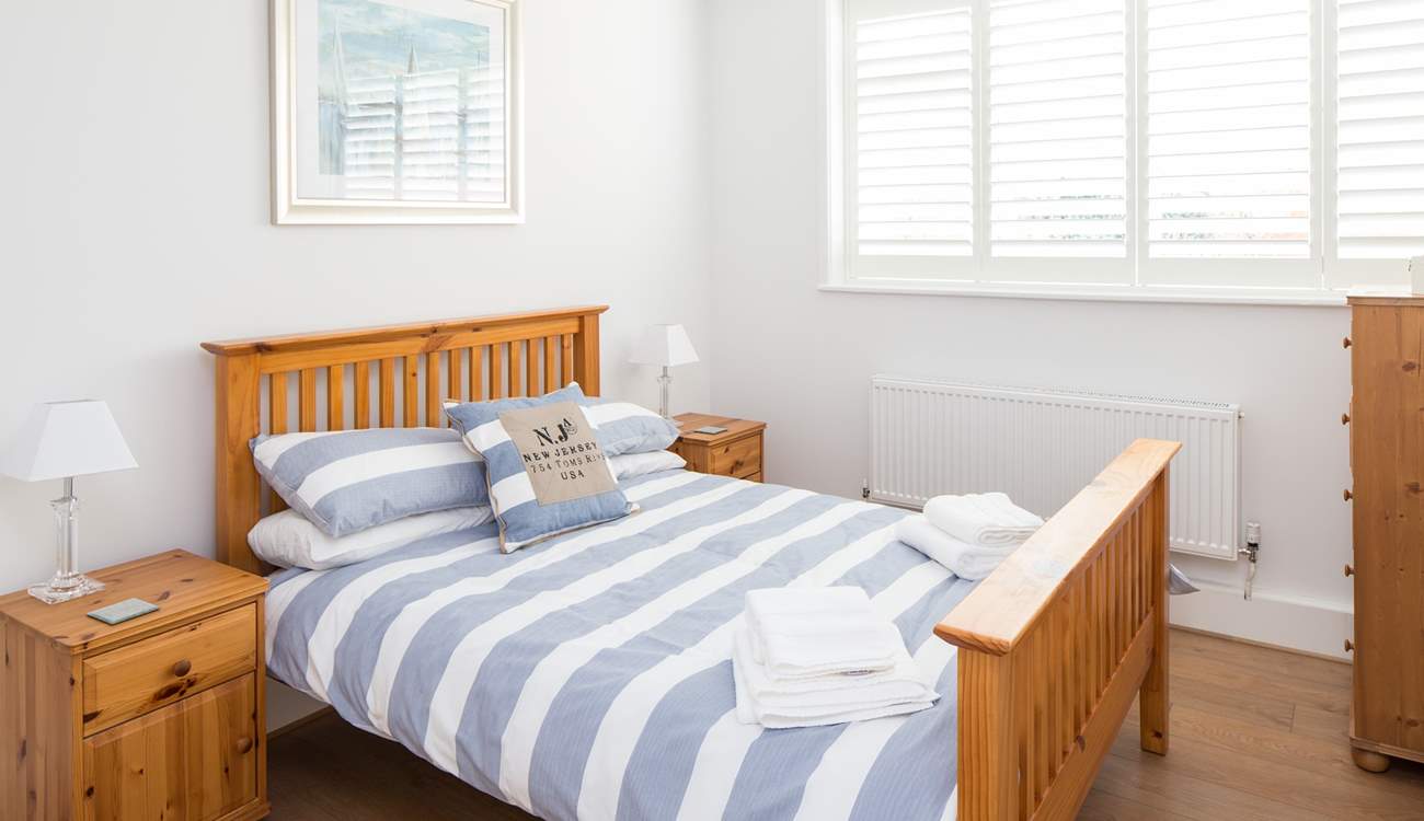 Bedroom 2 has a comfy 4ft 6in bed and plenty of space with built-in wardrobes,