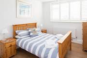 Bedroom 2 has a comfy 4ft 6in bed and plenty of space with built-in wardrobes,