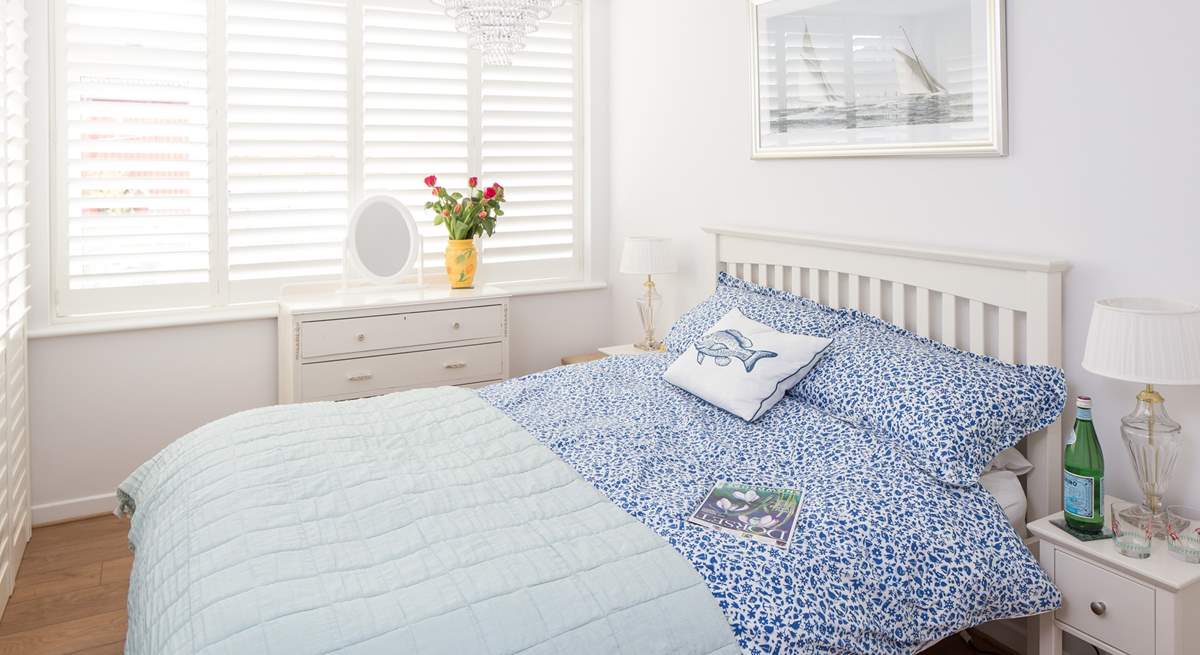 The main bedroom has a super comfy 4ft 6'' bed and gorgeous linens. The small en suite and a further door separates this room from the other bedrooms.