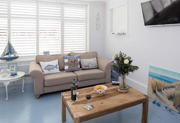 The open plan living-room is filled with light and has stylish plantation shutters. There is a Sonos Bluetooth system, so you can have music to relax to or watch the Smart TV which is Netflix enabled.