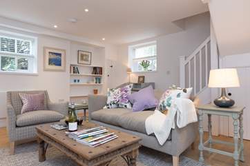 The beautifully presented sitting-room with a stylish mix of old and new to create a really welcoming feel.