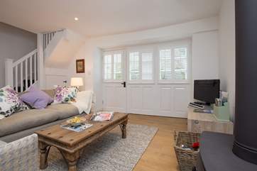 You can access the cottage through the lane door if you wish. The colonial style blinds give complete privacy yet the room is filled with light.