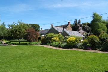 This view shows you the wider setting for The Coach House. Plenty of open space to give you a lovely view from your patio and yet plenty of privacy too.