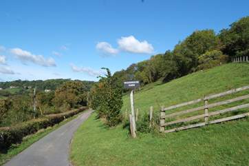 The long farm driveway leads to...