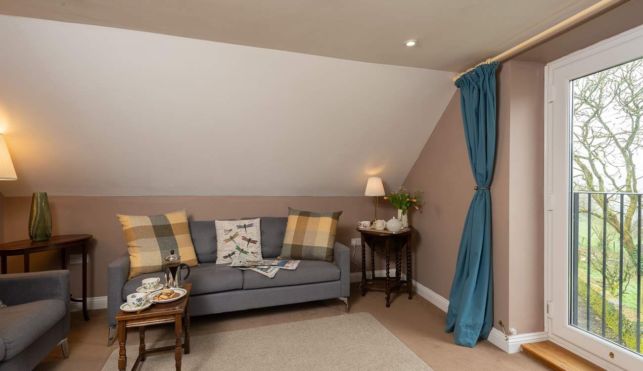 The first floor sitting-room makes the most of the fantastic valley views from the balcony.