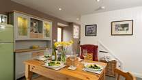 The working part of the kitchen is just around the corner on the other side of the door to the terrace.