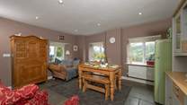 The dining/kitchen area also has comfortable seating if you prefer to be downstairs.