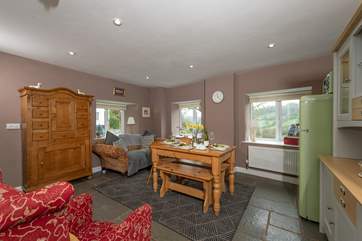 The dining/kitchen area also has comfortable seating if you prefer to be downstairs.