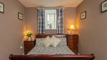 This is the ground floor bedroom with its double sleigh bed.