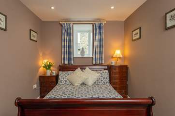 This is the ground floor bedroom with its double sleigh bed.