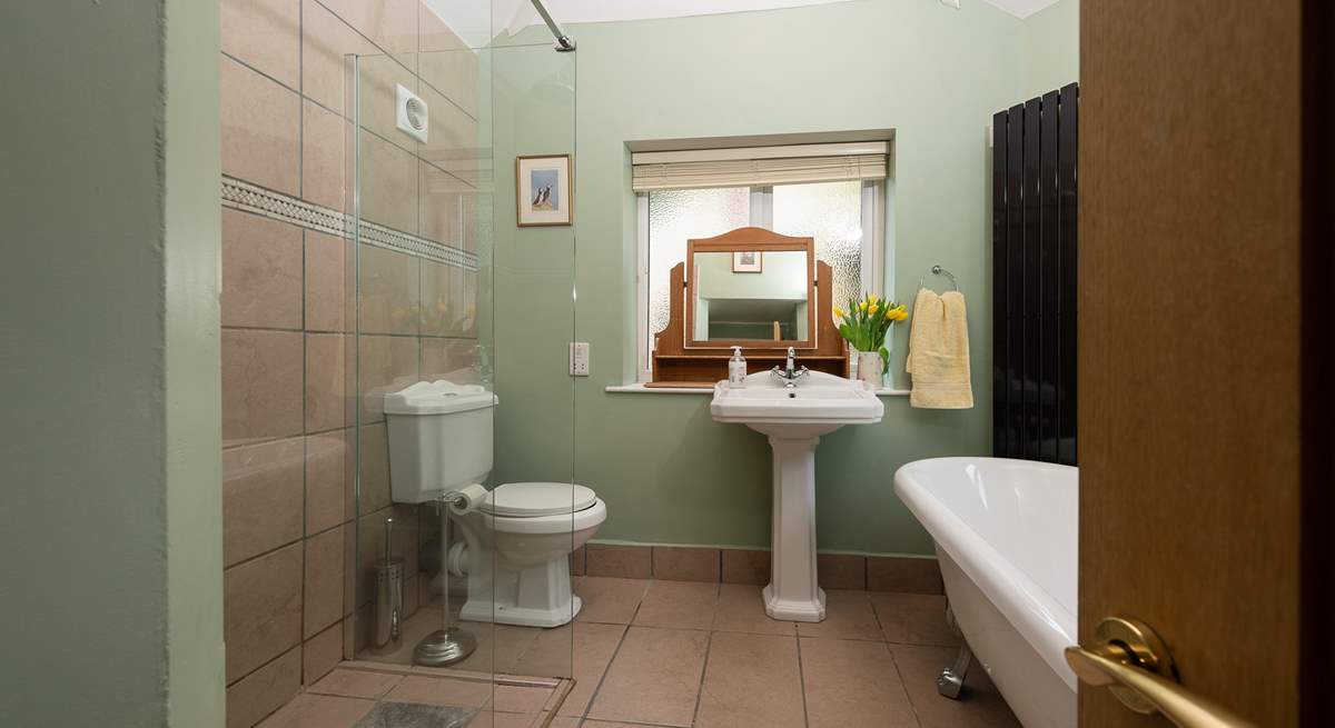 The ground floor bedroom has this en suite bathroom with separate shower cubicle.