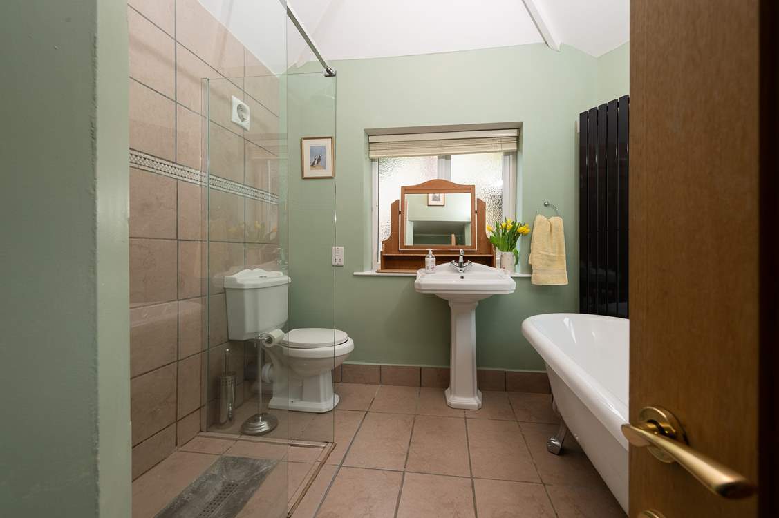 The ground floor bedroom has this en suite bathroom with separate shower cubicle.