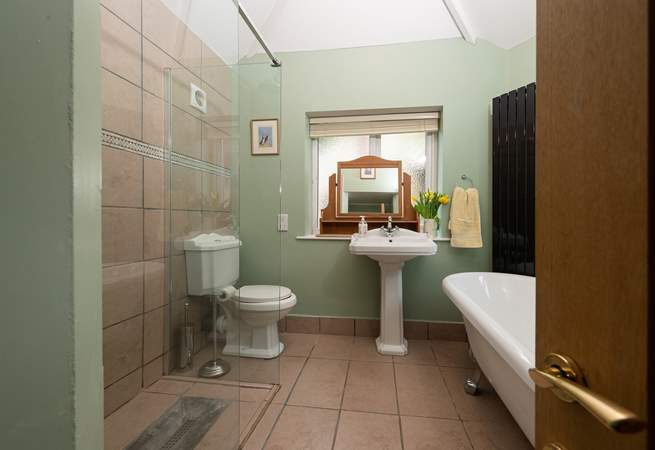 The ground floor bedroom has this en suite bathroom with separate shower cubicle.