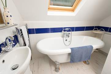 This bathroom is also on the first floor, right next to the main bedroom.