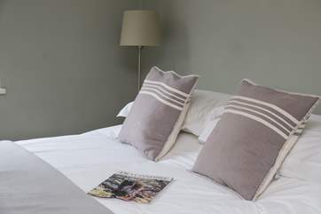 Crisp white linen on the bed.