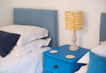 Pops of bright blue add cheerful colour.