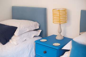Pops of bright blue add cheerful colour.