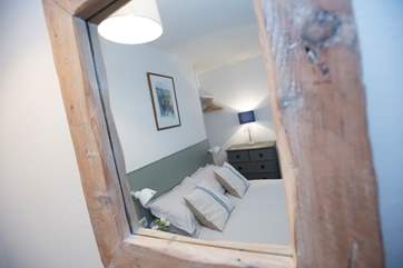 A driftwood-framed mirror.