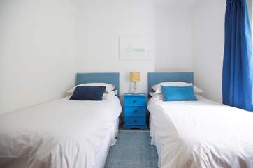 Bedroom 2 has twin beds plus a bespoke built-in cabin bed.