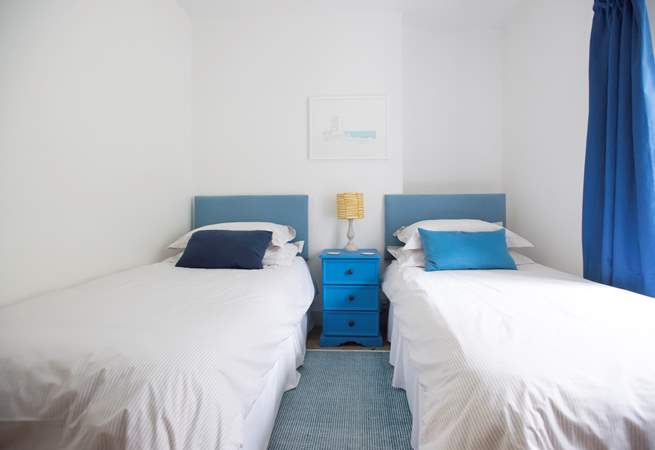 Bedroom 2 has twin beds plus a bespoke built-in cabin bed.