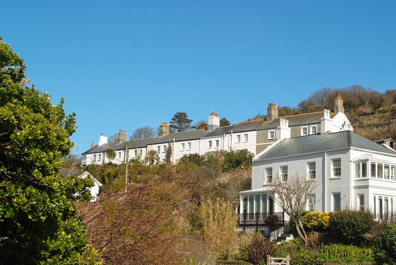 Looking up at Coastguard Terrace from the village (No 9 is on the far left).