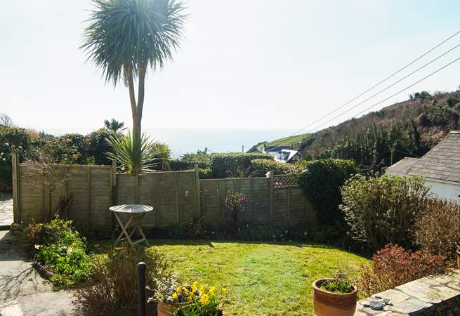 Looking across the neighbouring garden to the sea in the distance.