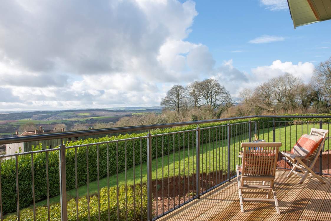 Bashford Lodge has a full width balcony to celebrate the most amazing views - you can see for miles!   