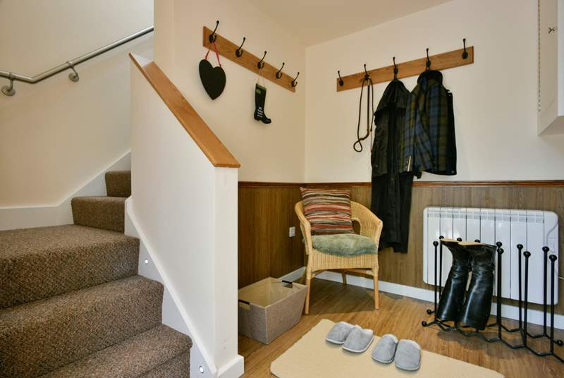 This is the ground floor entrance hallway - the thoughtful touch of slippers is a sign of the attention to detail here.