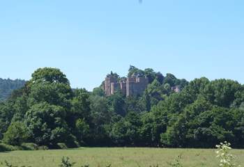 Dunster Castle towers above this unique medieval town, a stone's throw from the coast.