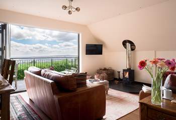 The wood burner completes this open yet cosy space perfectly