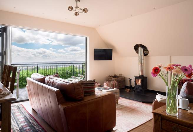 The wood burner completes this open yet cosy space perfectly