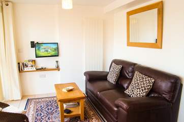The sitting-area opens on to the conservatory. (photo to follow)