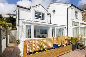 The terraced area is screened off for privacy.