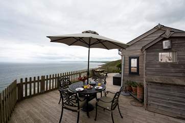 Dine al fresco, taking in the glorious vista.
