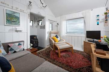 The sitting-room is wonderfully light and airy.