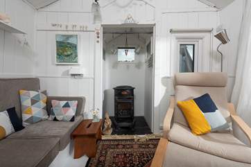 The antique-effect gas stove will keep you warm and toasty whatever the weather.