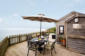 Dine al fresco, taking in the glorious vista.