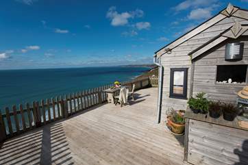 Rockwater Cabin is in the most outstanding setting, nestled into the cliff.