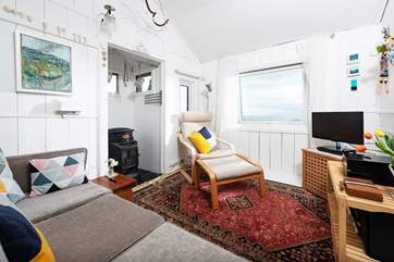 The sitting-room is wonderfully light and airy. (the stove has since been removed)