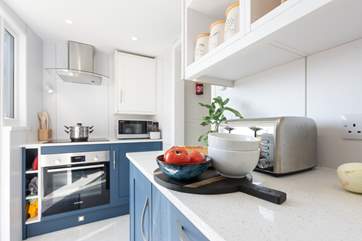 The galley kitchen is small but so perfectly formed