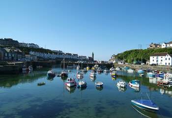 The pretty harbour at Porthleven is surrounded by cafes, small shops and restaurants, something for everyone.